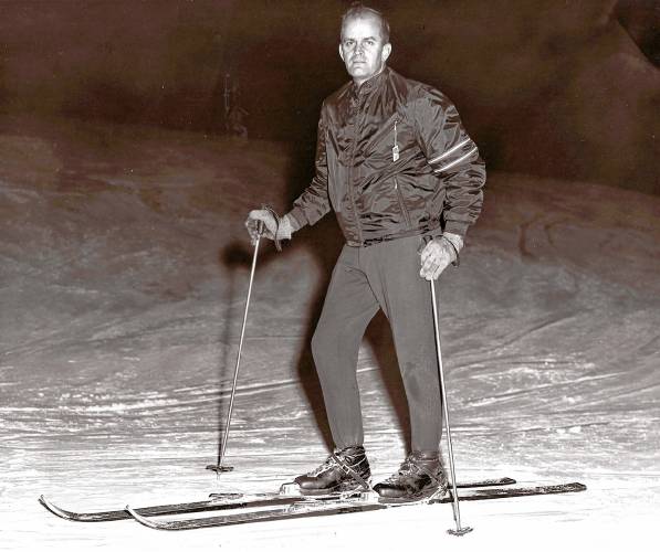 Royal Houghton skis with friends from Bryant's during night skiing at Mt. Ascutney in a circa 1960s photograph. (Family photograph)
