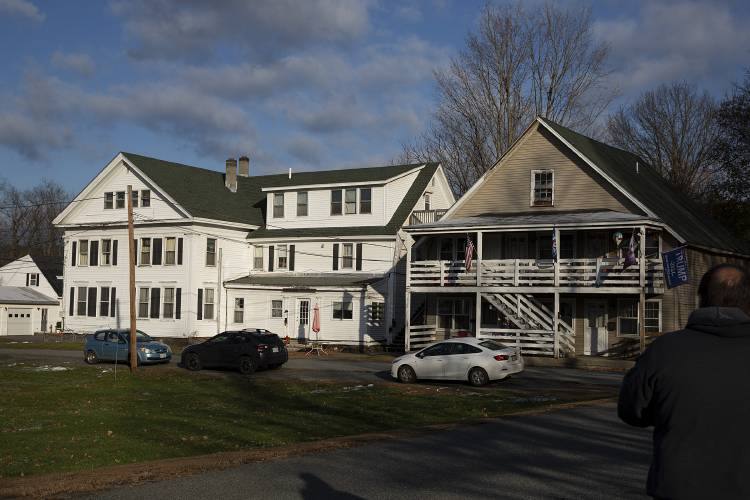 Two apartment buildings on Maple Street in West Lebanon, N.H., photographed on Friday, Nov. 18, 2022, which were purchased by Growth Cap Management owner Robert Parpinelli in November 2022 with plans to renovate them and rent out the apartments at a higher rate. Parpinelli now hopes further develop the property. (Valley News / Report For America - Alex Driehaus) Copyright Valley News. May not be reprinted or used online without permission. Send requests to permission@vnews.com.