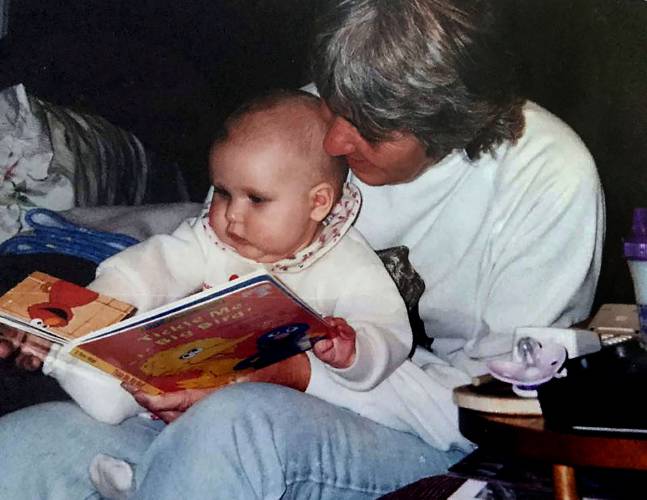 Fran Hanchett reads to her granddaughter Mikala Wentworth in 1998. (Family photograph) 